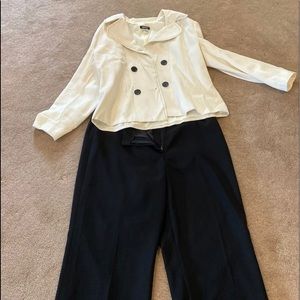 Women’s black and white suit size 18